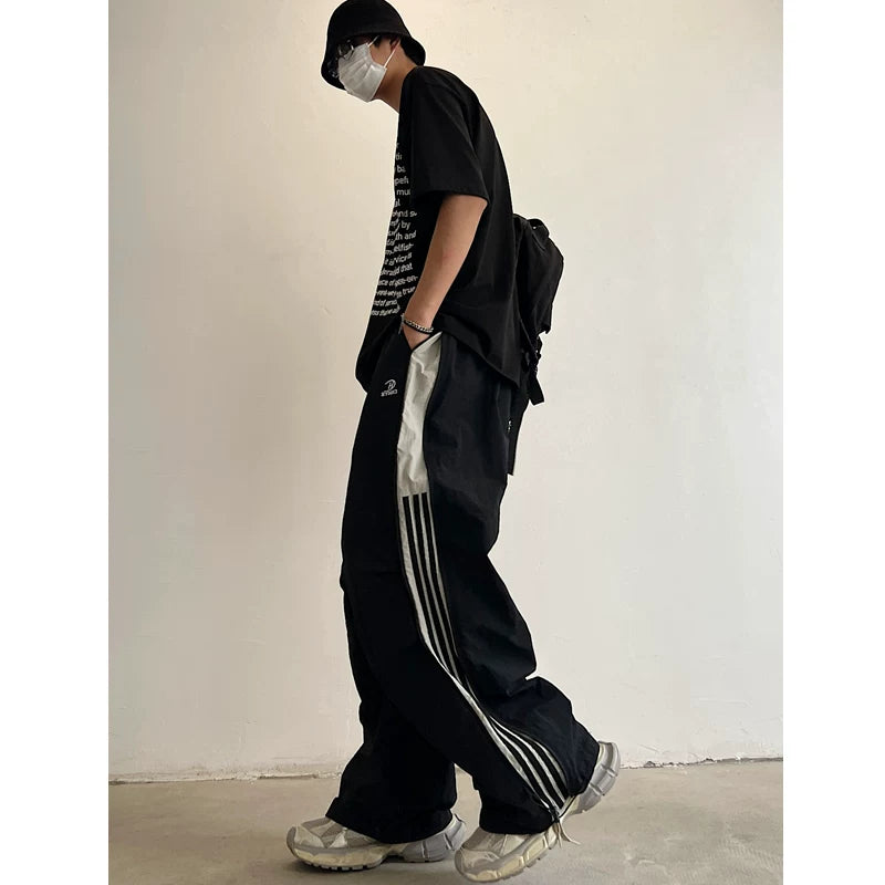 NYLON BASE ZIP LINE DESIGN PANTS MNW2096
